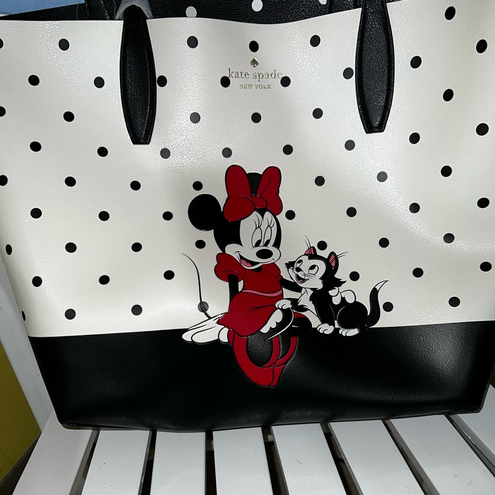 Brand new Kate Spade Minnie Mouse tote bag. Never used. Tag still attached.